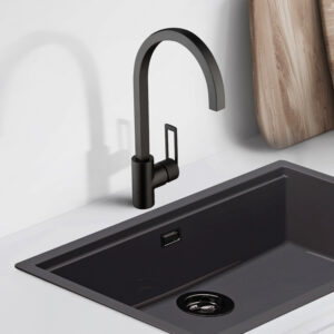 Close up of gray kitchen sink standing on white countertops with potted plants, cutting boards and dishes in modern room with white walls. 3d rendering